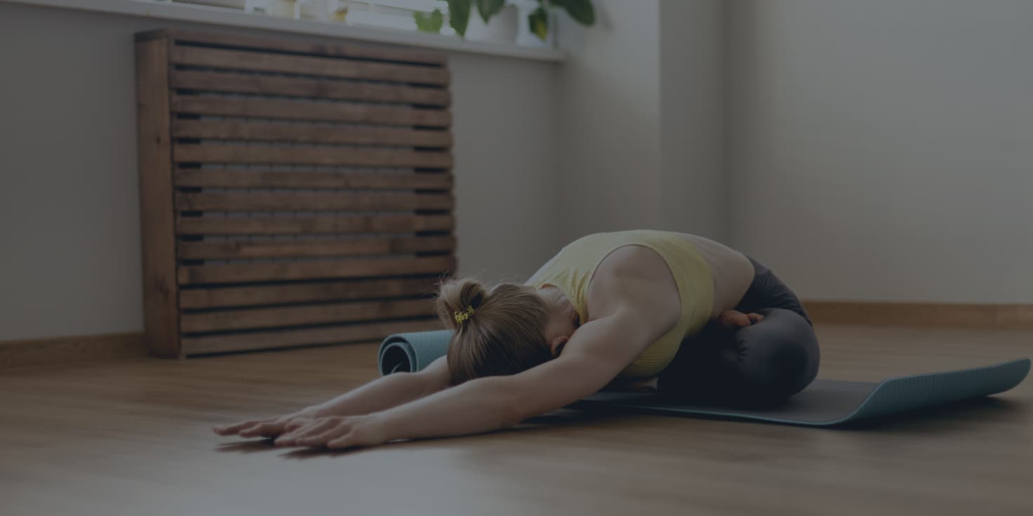 Femme pratiquant le Yin Yoga
